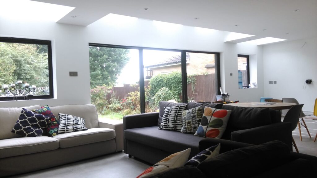 Eco-friendly construction site by AMBS Eco Solutions in Princes Risborough, featuring solar panel installation.