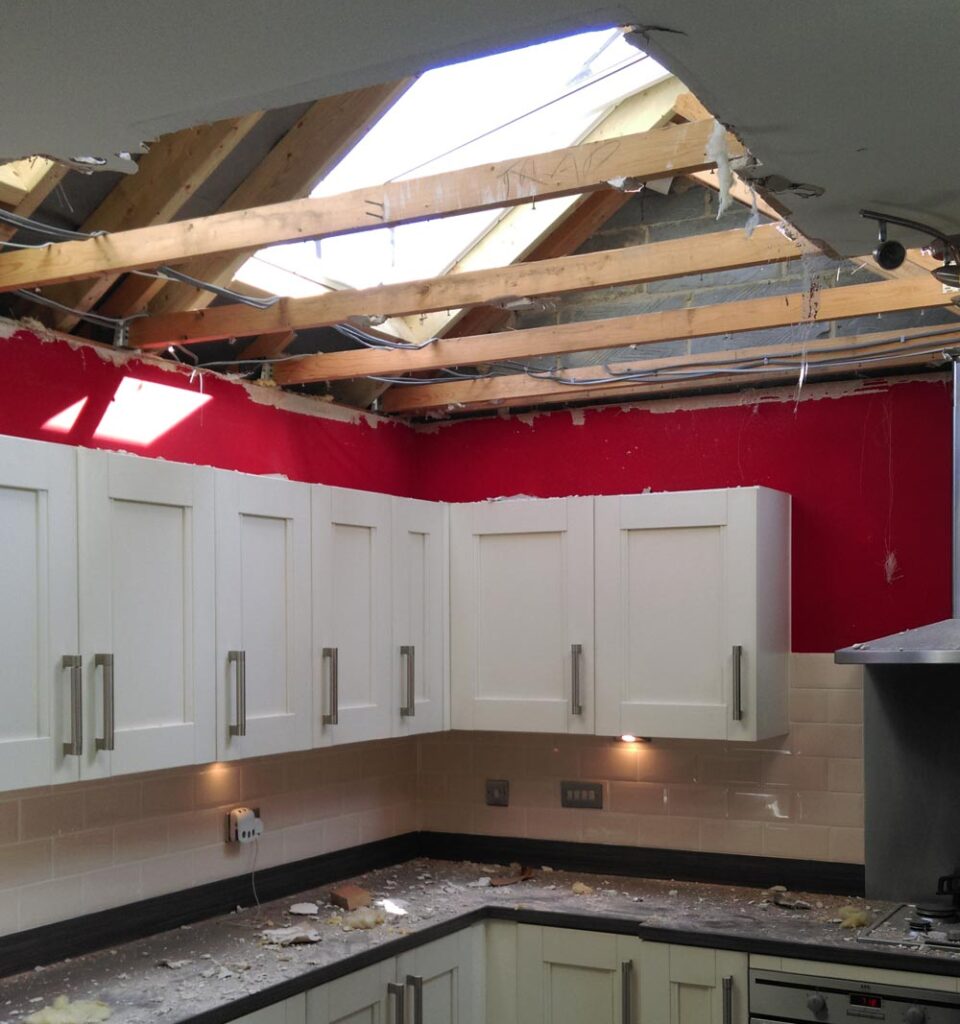 Damaged kitchen space highlighting unsafe conditions for AMBS Eco Solutions demolition and site clearance services.